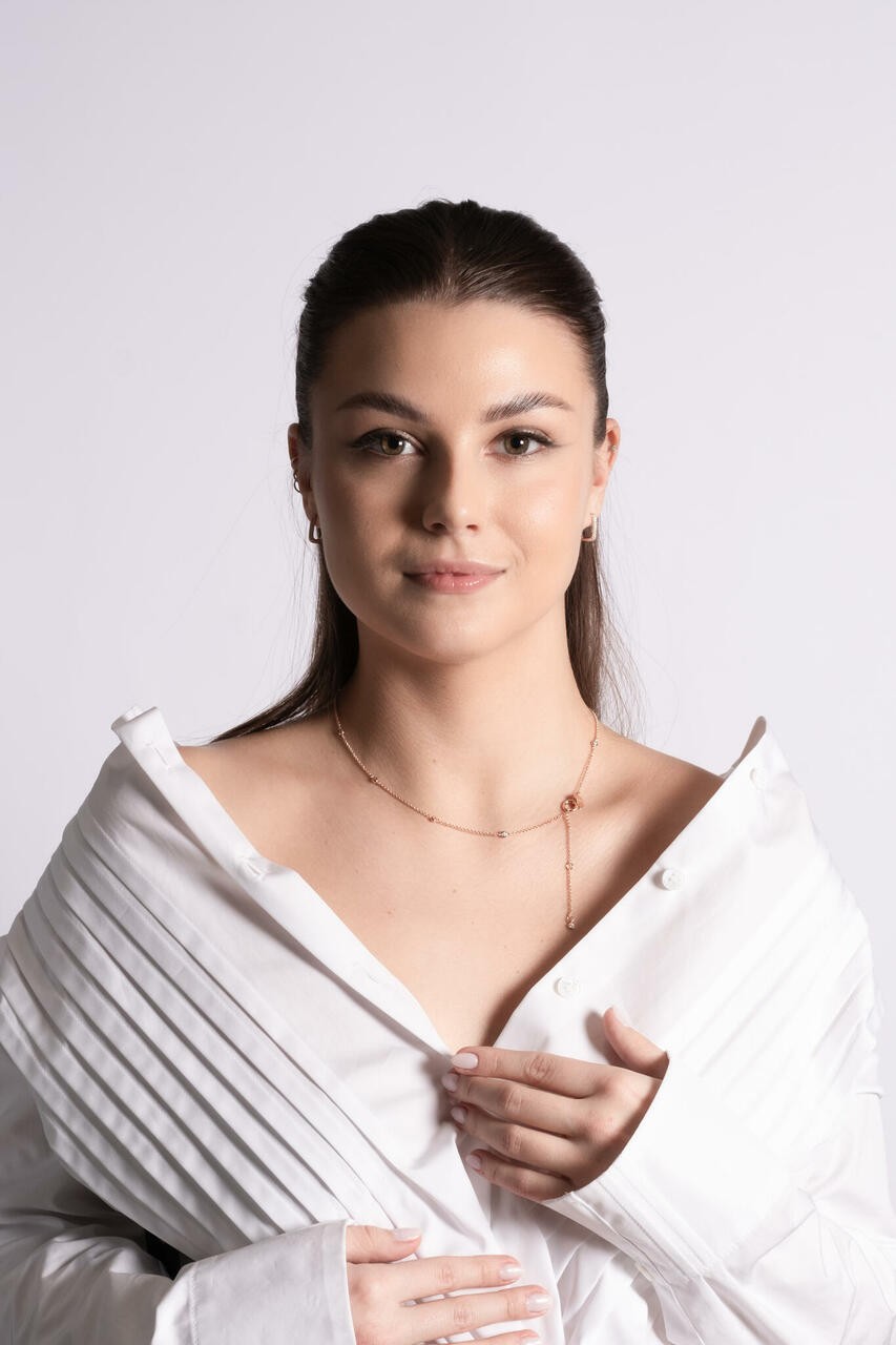 Scandinavian Minimal Gold Set with minimalist gold necklace, small hoop earrings, and elegant Nordic bracelet in minimalist Scandinavian style